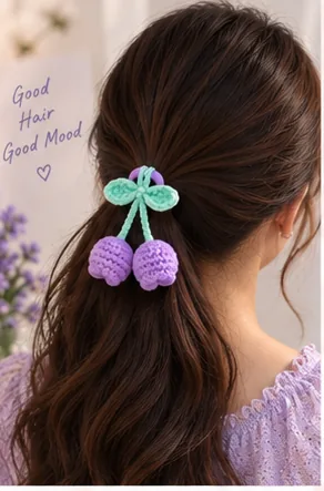 Purple crochet tulip hair tie worn in a ponytail